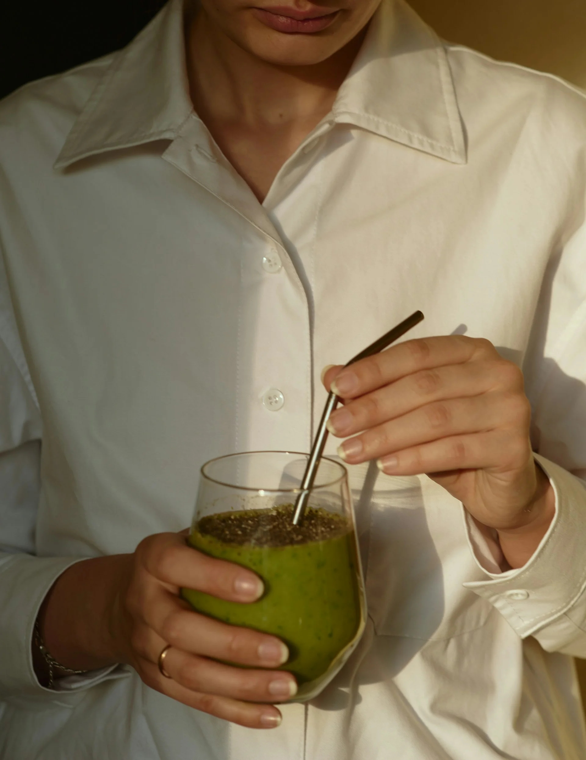 elegant man drinking a healthy smoothie