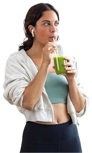 healthy woman drinking a smoothie